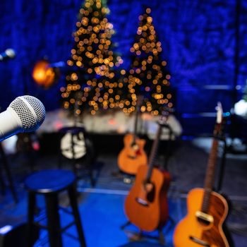 Microphone and guitars on stage during Christmas Holiday show